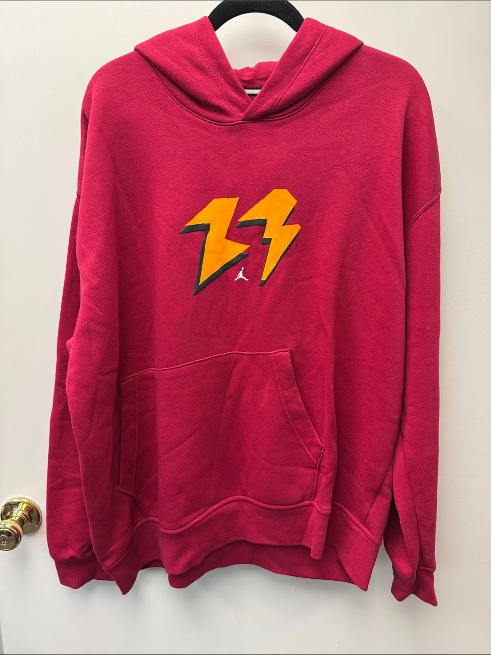 Jordan Red Hoodie with Yellow Lightning Bolt Graphic